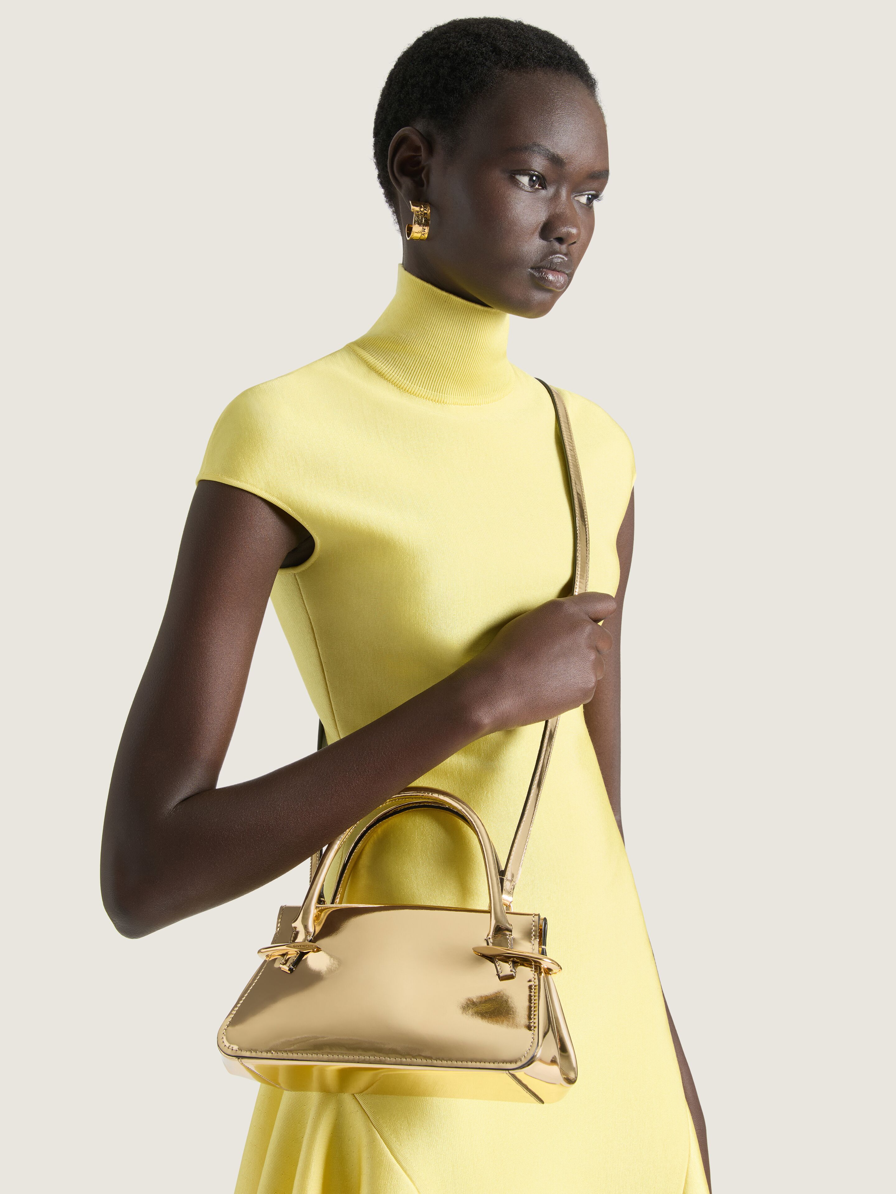 Mini Pinch bag in mirror effect leather